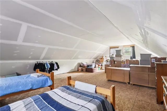 a bedroom with furniture and a couch