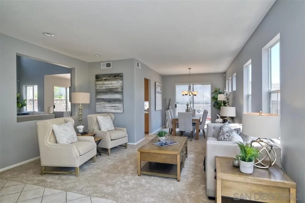 11574 Village Ridge Road San Diego, CA 92131 - Photo 2 of 25 a living room with furniture and wooden floor