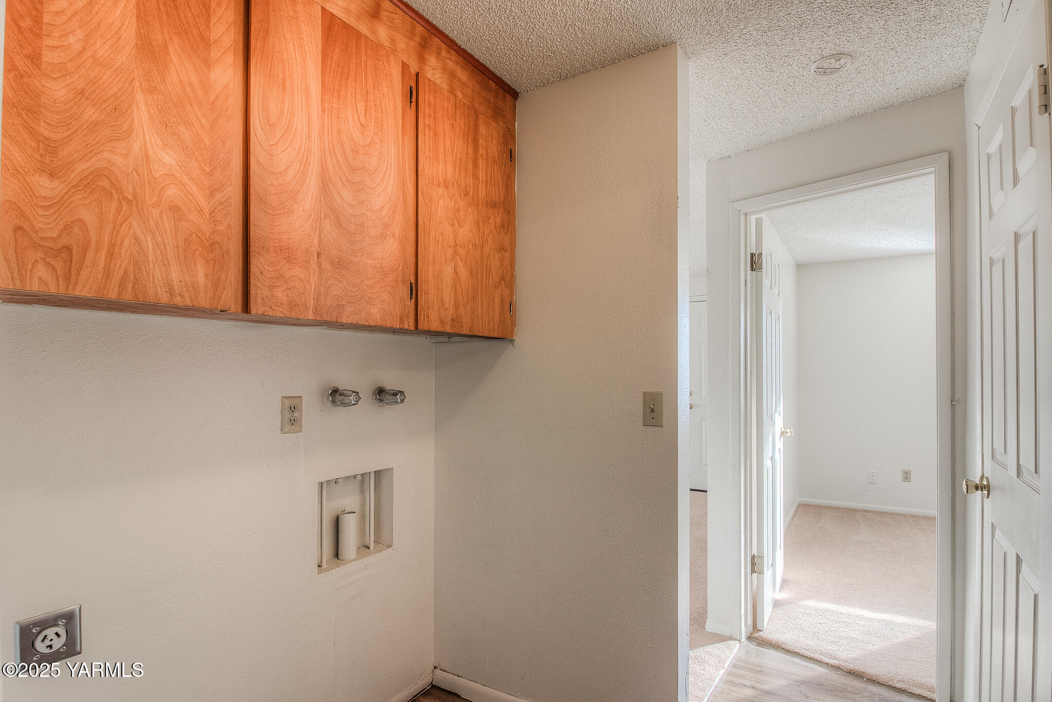 104 Moxee Avenue Naches, WA 98937 - Photo 16 of 22 a view of cabinets and wooden floor