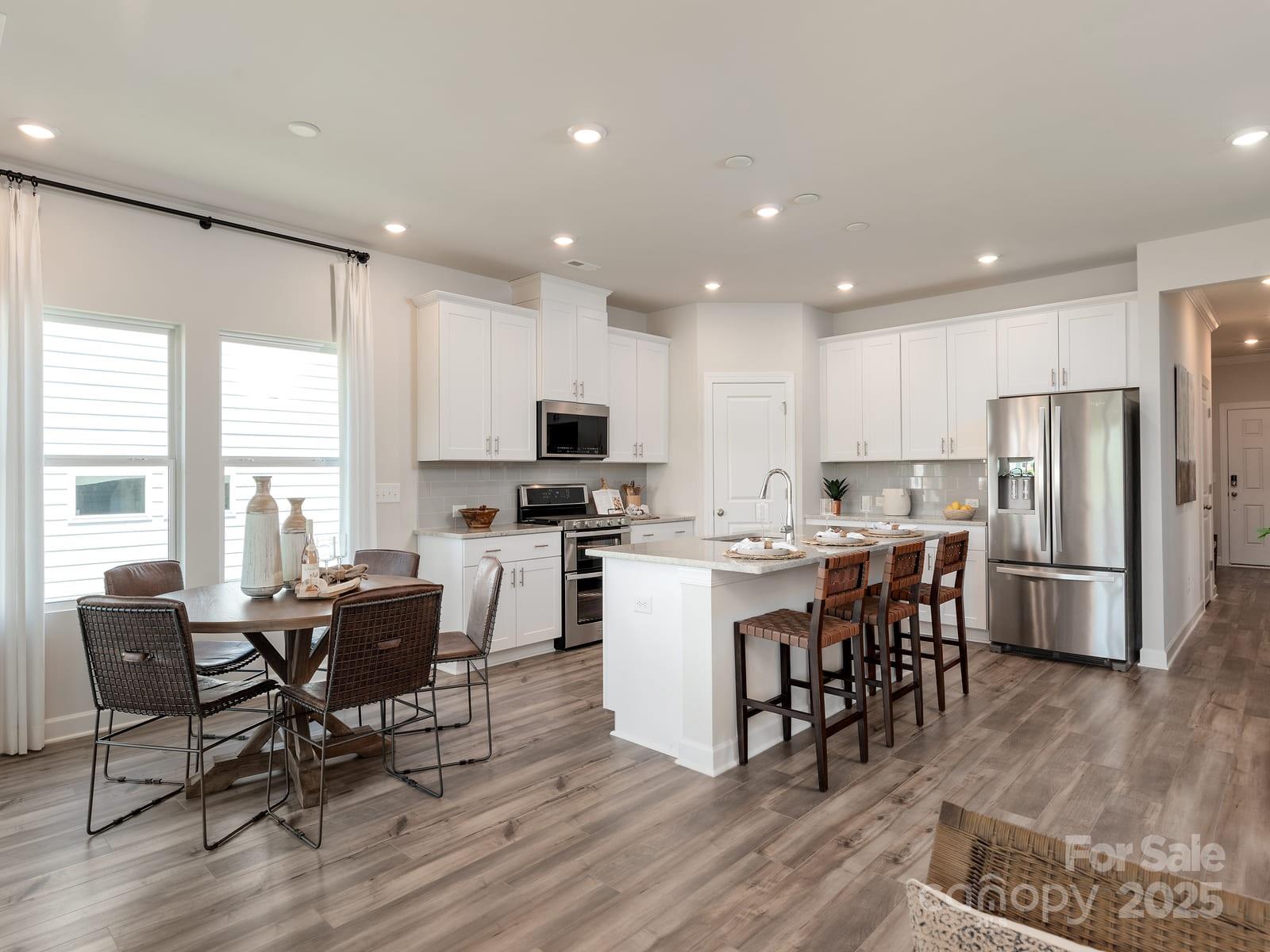 760 Palmer Pendleton Way York, SC 29745 - Photo 12 of 12 a view of kitchen with cabinets table and chairs