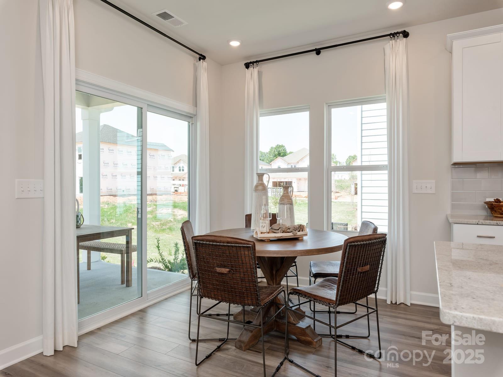 760 Palmer Pendleton Way York, SC 29745 - Photo 6 of 12 a view of a dining room with furniture and a window