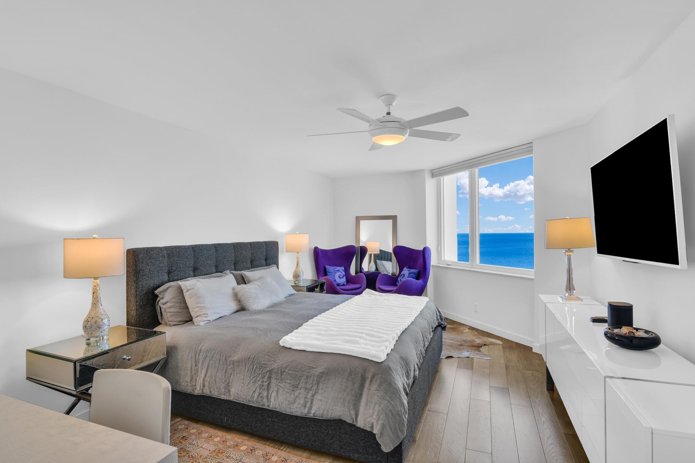 500 South Ocean Boulevard, Unit 1905 Boca Raton, FL 33432 - Photo 22 of 73 a bed room with bed and a flat screen tv