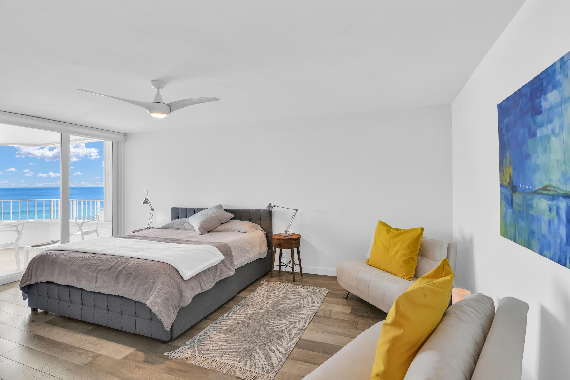 500 South Ocean Boulevard, Unit 1905 Boca Raton, FL 33432 - Photo 27 of 73 a bedroom with a bed couch and window