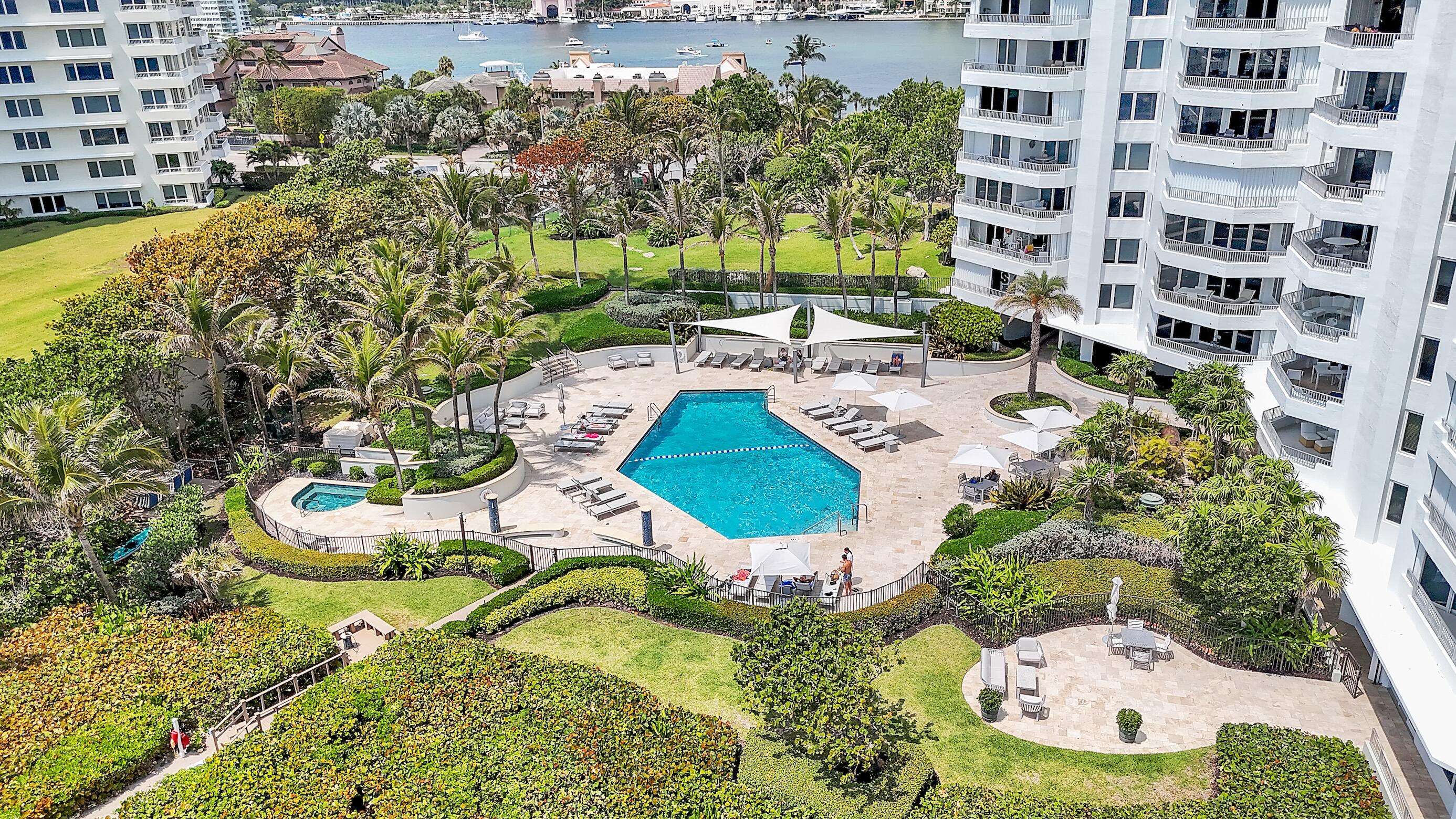 500 South Ocean Boulevard, Unit 1905 Boca Raton, FL 33432 - Photo 51 of 73 a view of a swimming pool with outdoor seating and plants