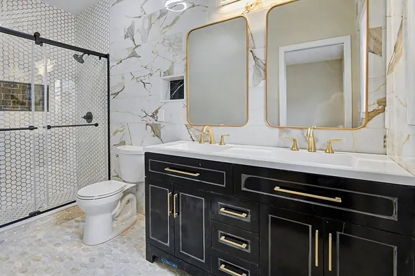 a bathroom with a sink and a toilet