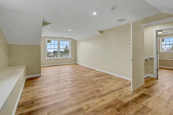 wooden floor in a hall with an entryway