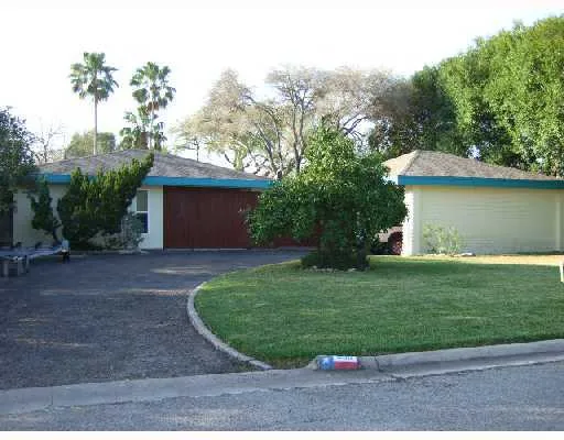 a view of a back yard of the house