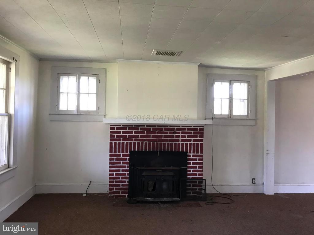 27479 Fairmount Road Westover, MD 21871 - Photo 4 of 16 Foyer to 15'3"x15' Living Room with Fireplace