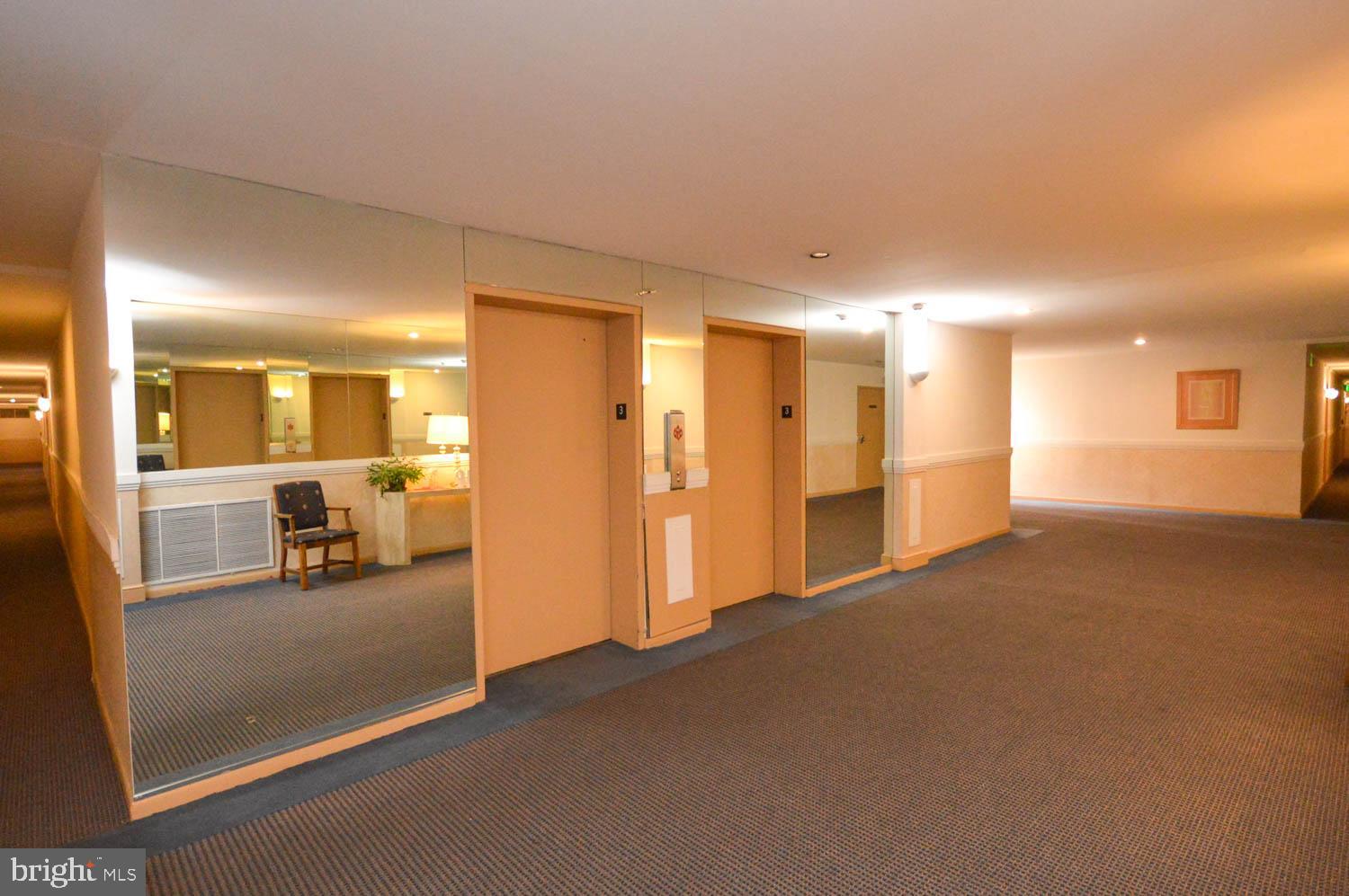 6317 Park Heights Avenue, Unit 310 Baltimore, MD 21215 - Photo 12 of 37 a view of a livingroom with wooden furniture