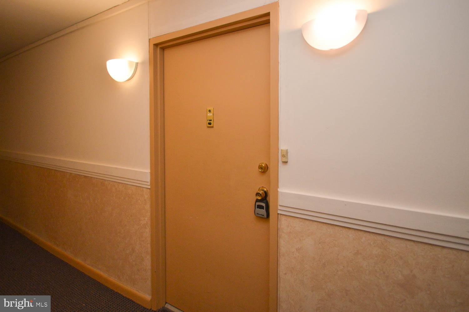 6317 Park Heights Avenue, Unit 310 Baltimore, MD 21215 - Photo 14 of 37 a bathroom with a shower