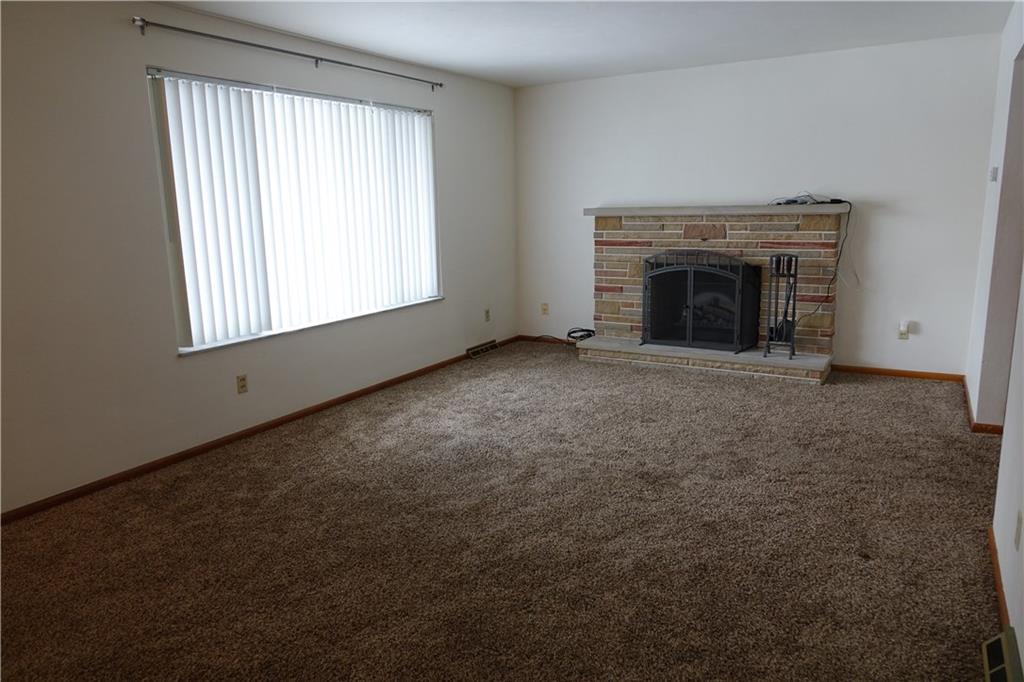 420 Whitestown Road Butler, PA 16001 - Photo 3 of 22 Living Room with fireplace and newer carpeting
