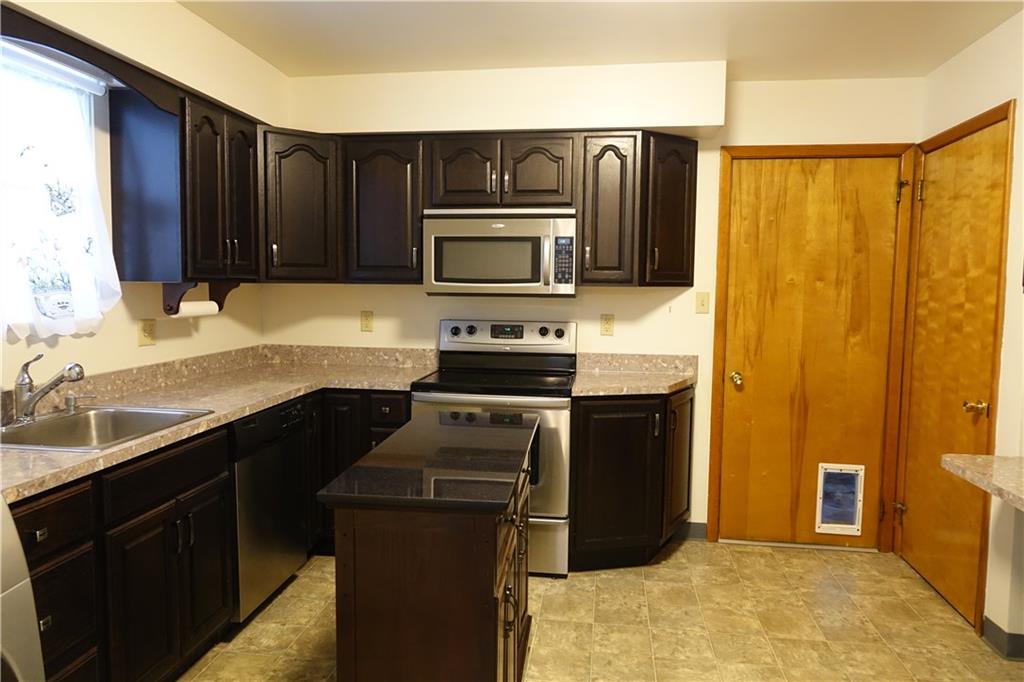 420 Whitestown Road Butler, PA 16001 - Photo 5 of 22 Remodeled kitchen with stainless steel appliances and kitchen island