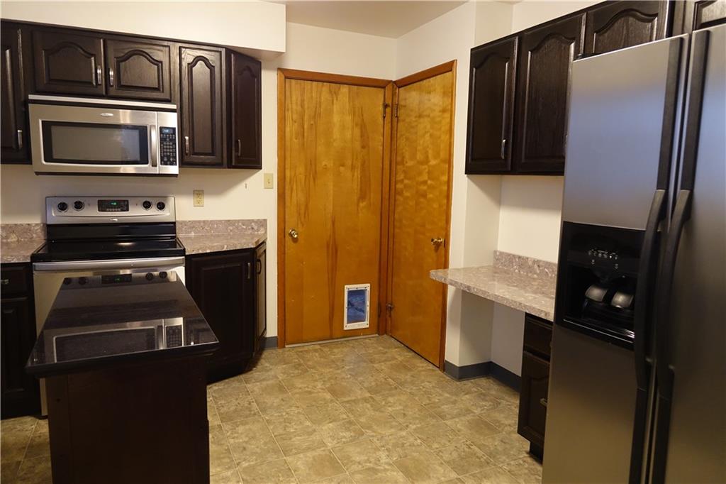 420 Whitestown Road Butler, PA 16001 - Photo 7 of 22 Remodeled kitchen with stainless steel appliances and kitchen island
