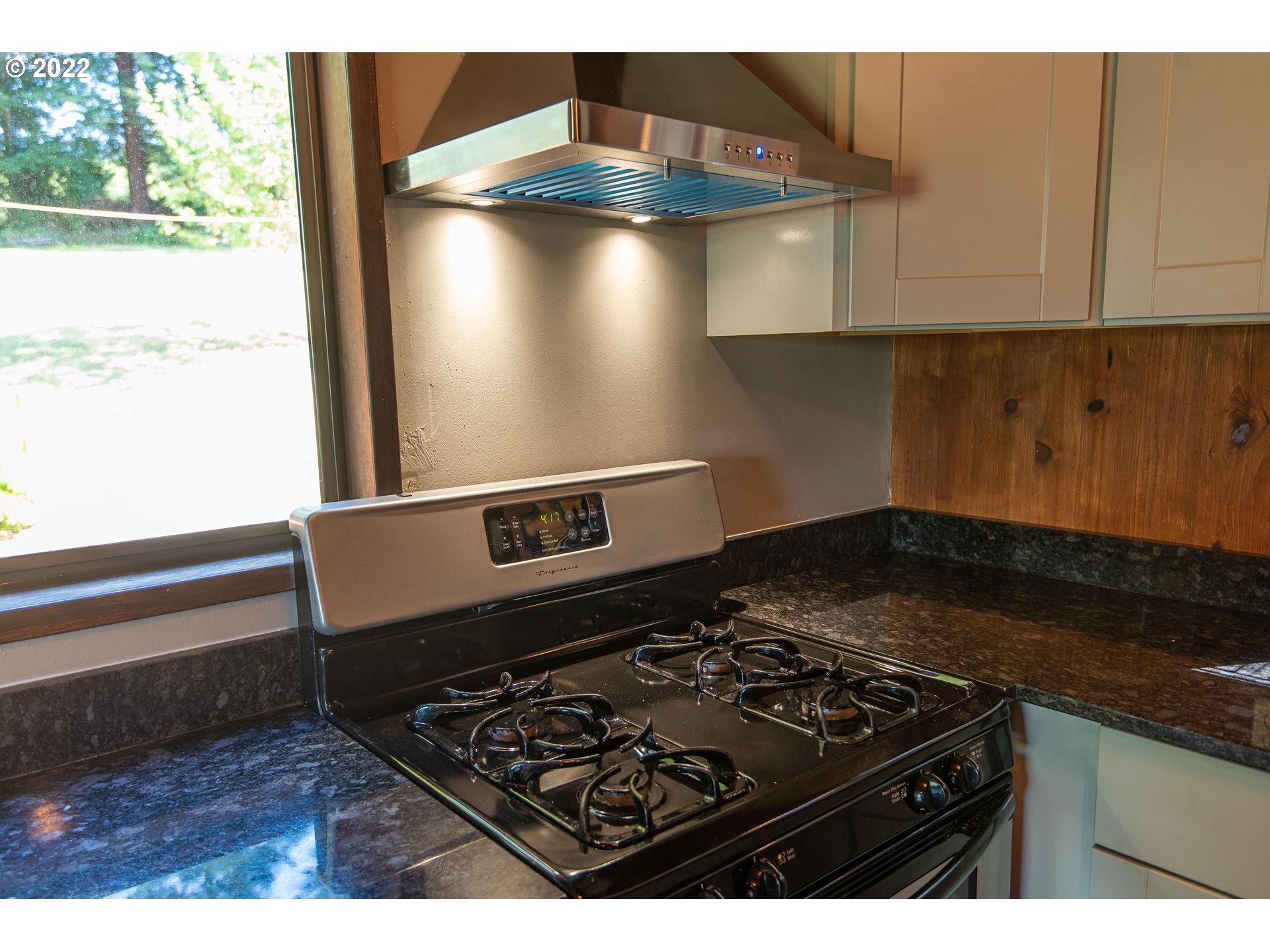 66001 Sunshine Road Coos Bay, OR 97420 - Photo 11 of 32 a stove top oven sitting inside of a kitchen