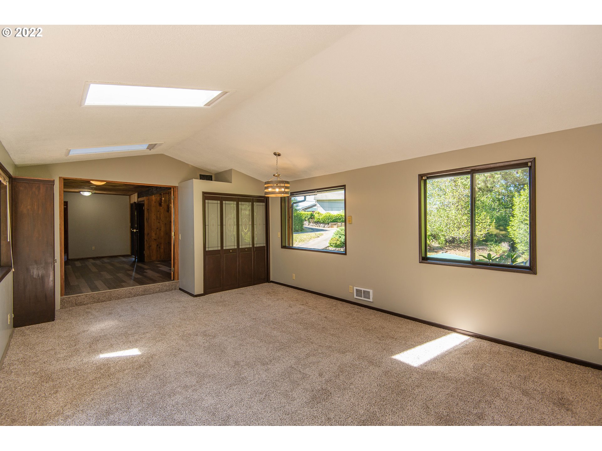 66001 Sunshine Road Coos Bay, OR 97420 - Photo 14 of 32 a view of an empty room with a window