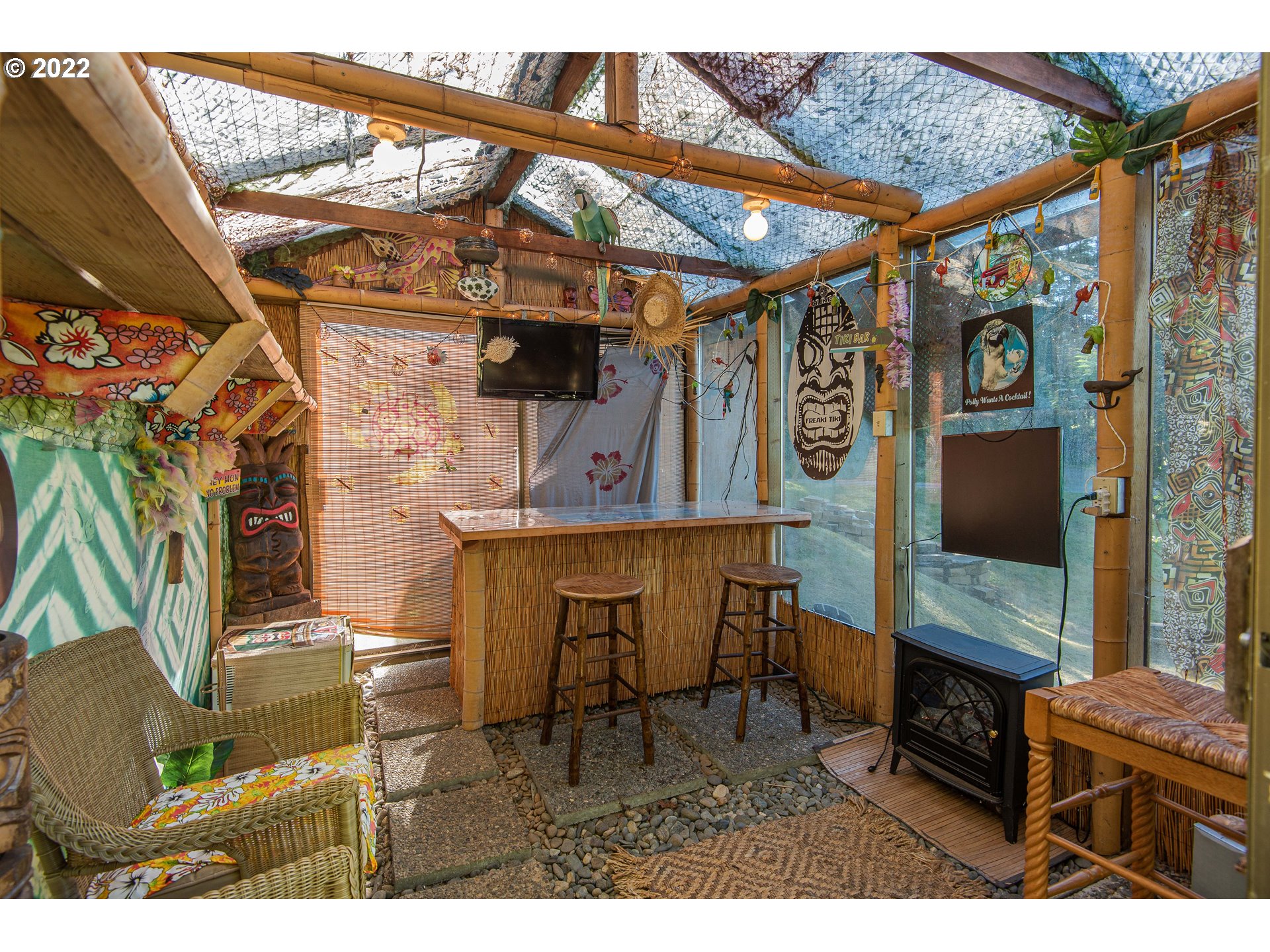 66001 Sunshine Road Coos Bay, OR 97420 - Photo 26 of 32 a living room with furniture and a flat screen tv