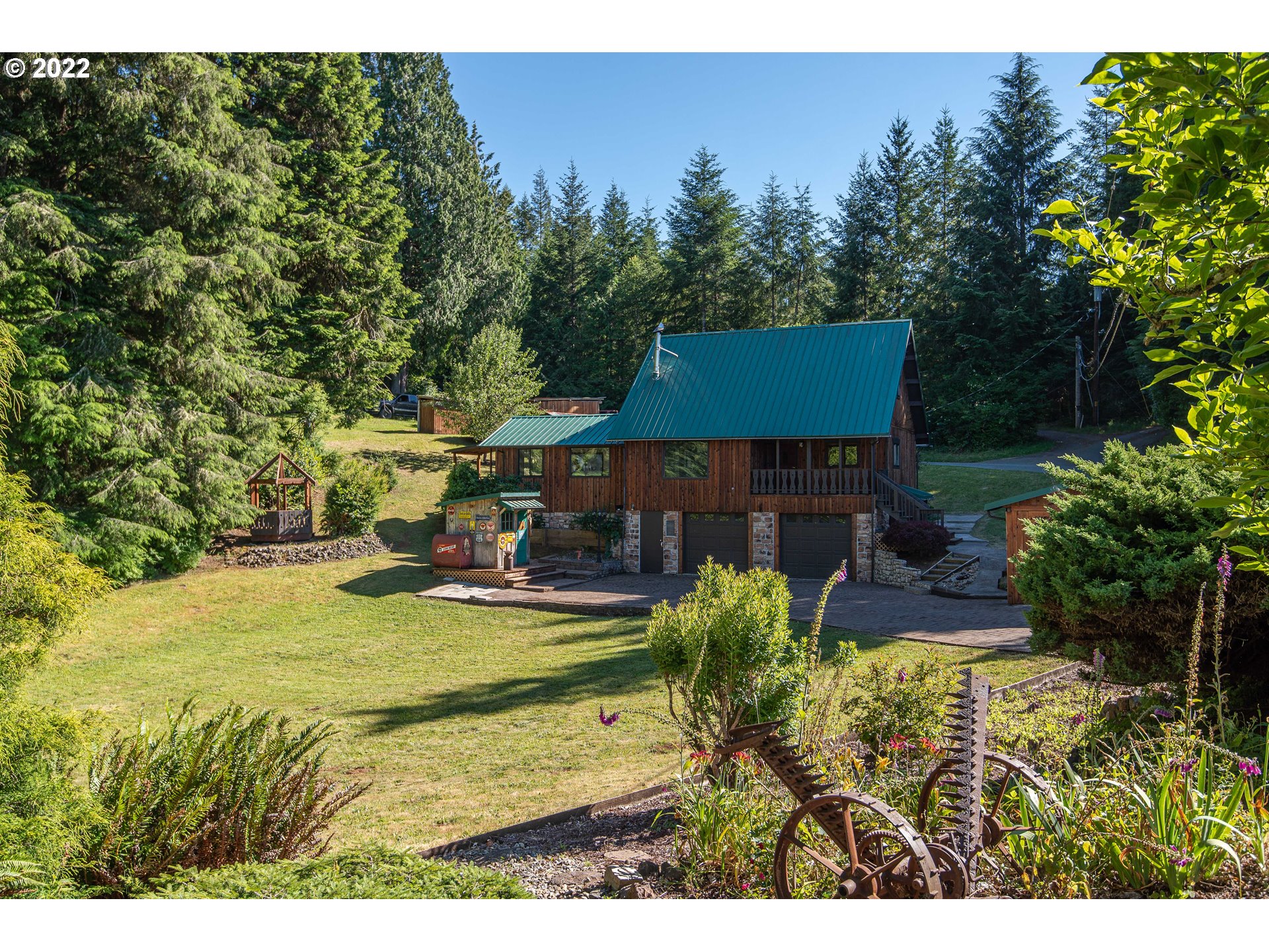 66001 Sunshine Road Coos Bay, OR 97420 - Photo 27 of 32 a view of a house with pool and sitting area