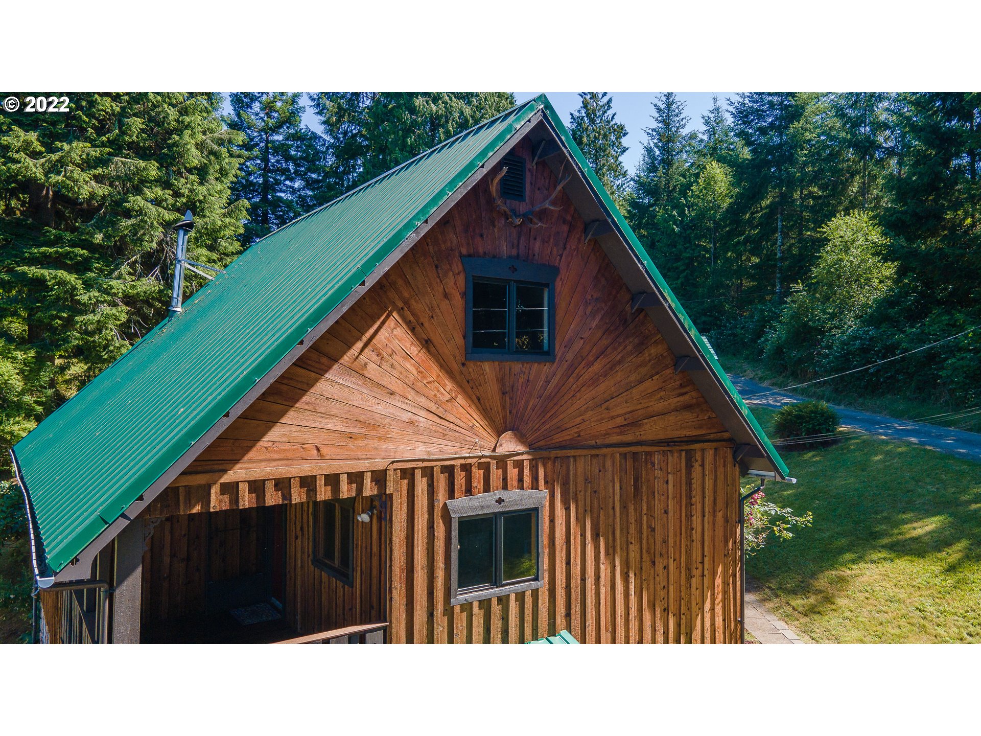 66001 Sunshine Road Coos Bay, OR 97420 - Photo 29 of 32 a black and white photo of a house