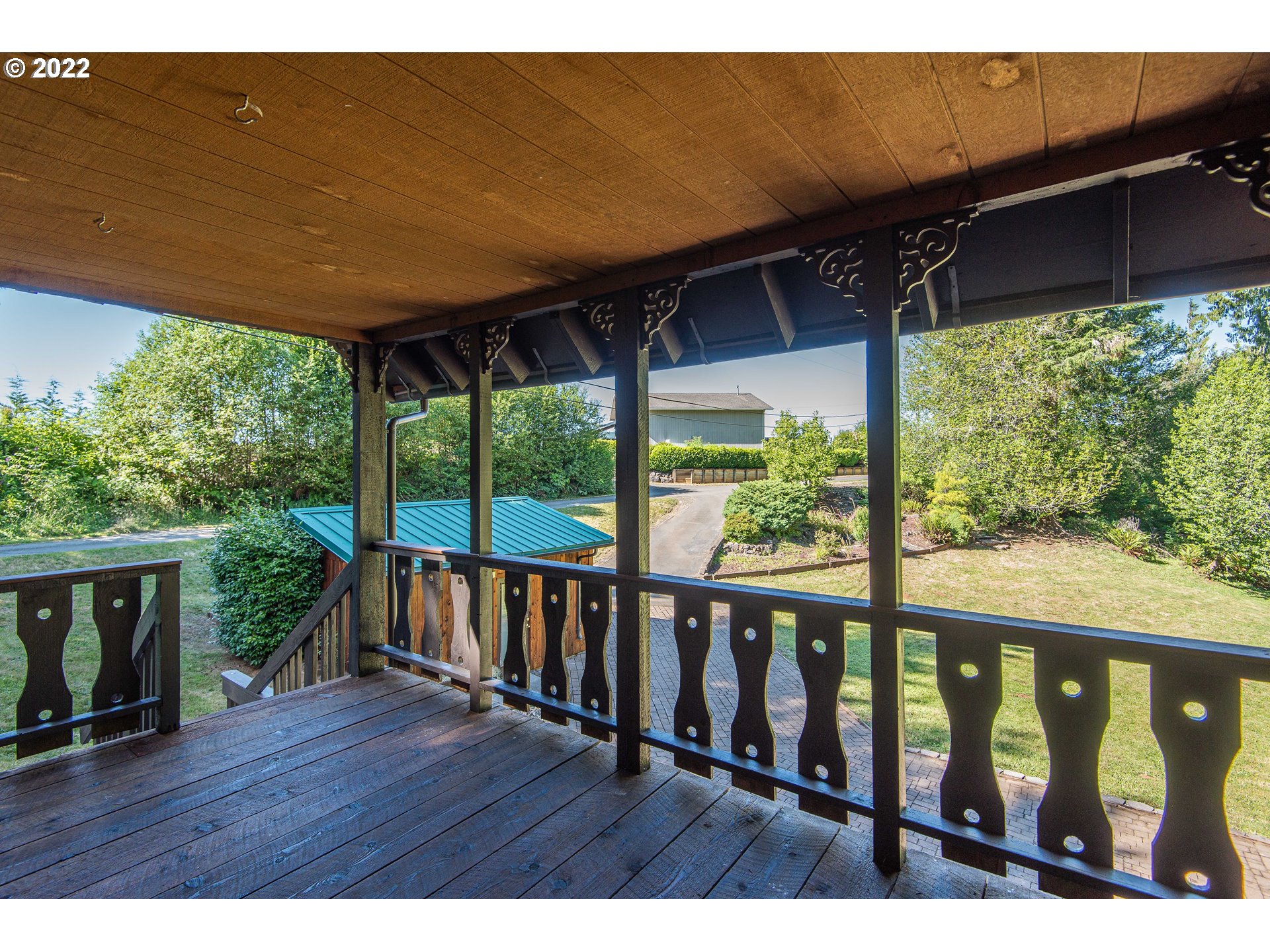 66001 Sunshine Road Coos Bay, OR 97420 - Photo 31 of 32 a view of outdoor space with deck and wooden floor