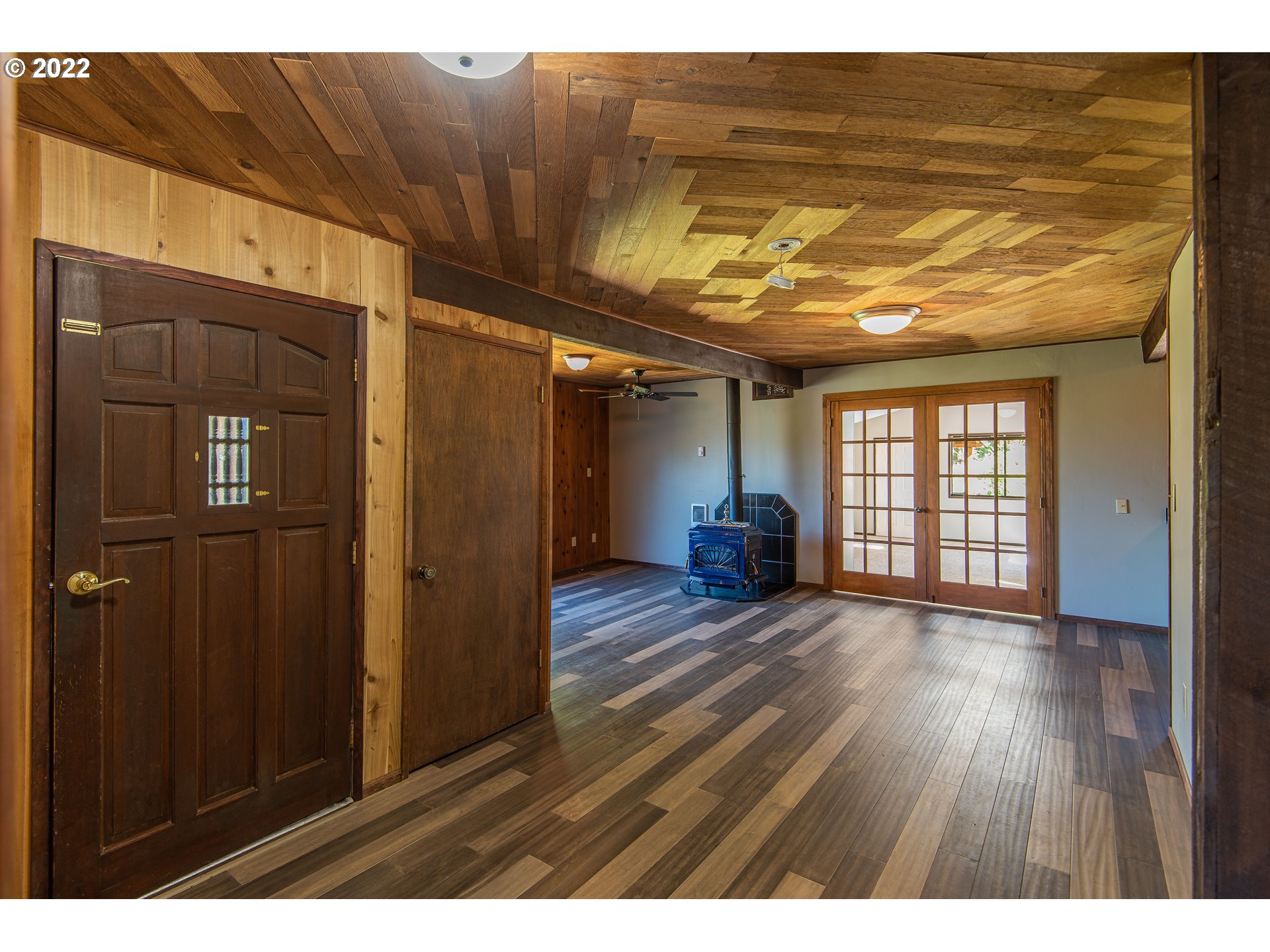 66001 Sunshine Road Coos Bay, OR 97420 - Photo 5 of 32 a view of hallway with wooden floor