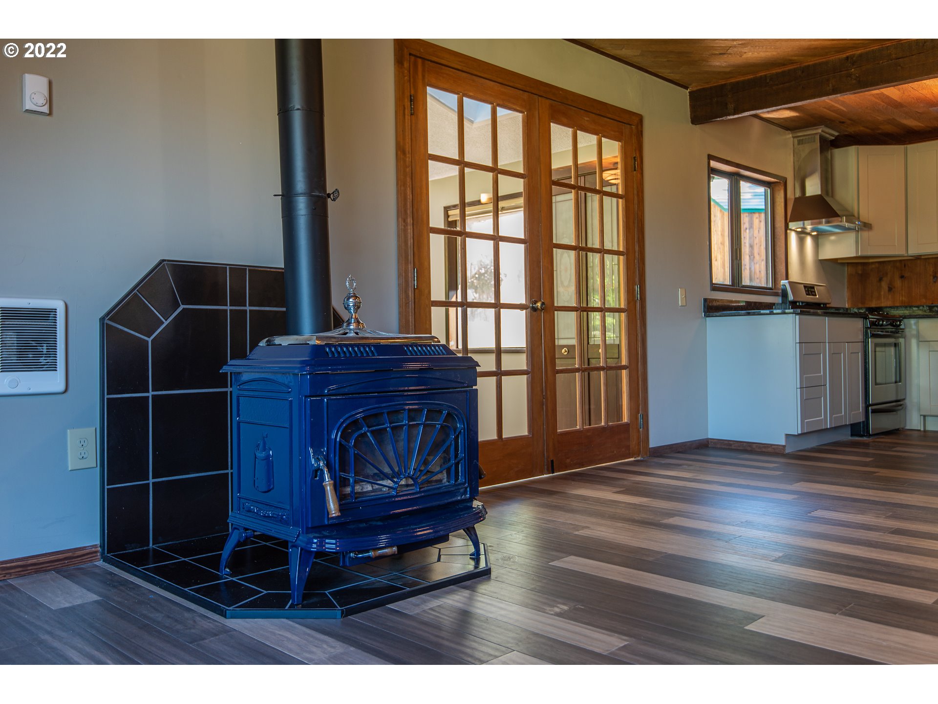 66001 Sunshine Road Coos Bay, OR 97420 - Photo 8 of 32 a living room with hard wood floors and a window
