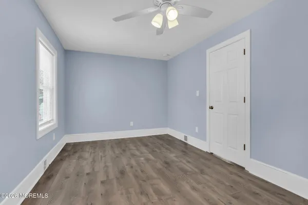 a kitchen with stainless steel appliances granite countertop a refrigerator and a stove