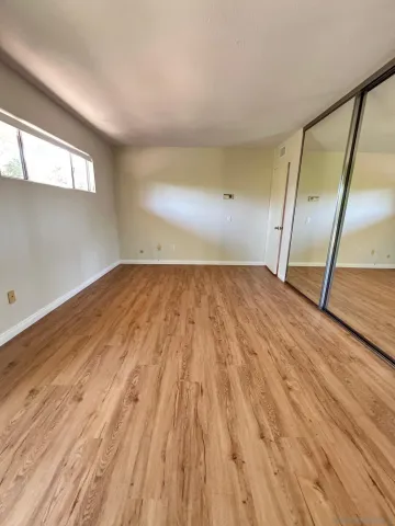 a bathroom with a shower and a toilet