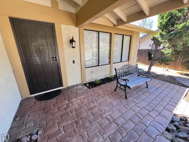 a view of a lounge chair in the patio