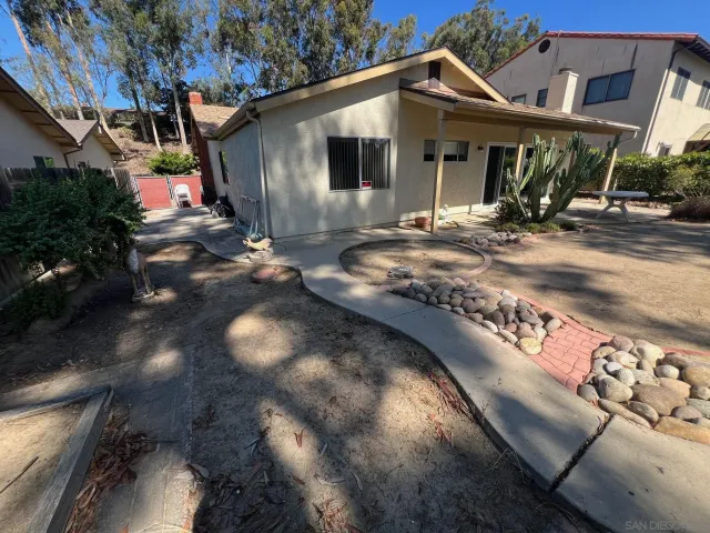 a front view of a house with yard