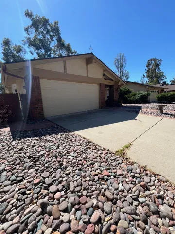 a front view of house with yard