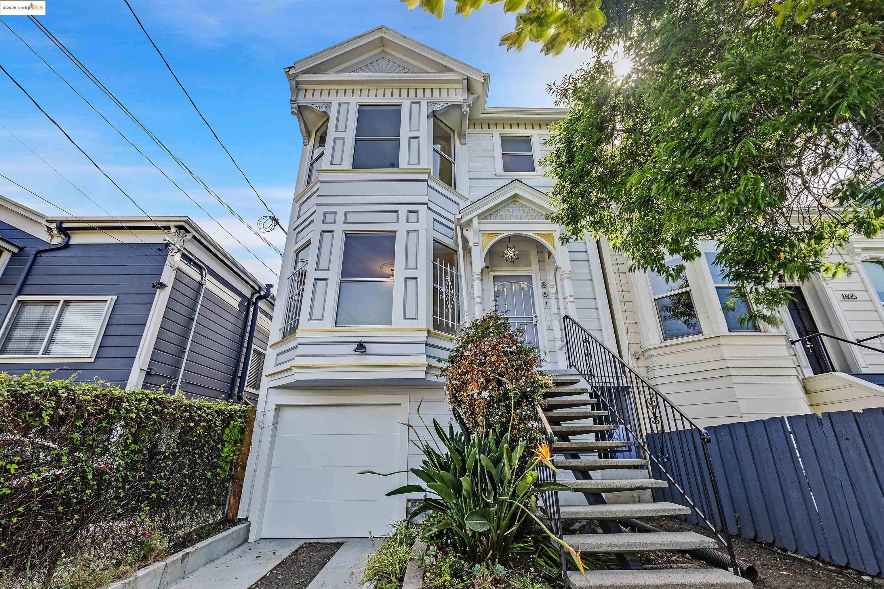 861 20th Street Oakland, CA 94607 - Photo 1 of 1 a front view of a house with a yard