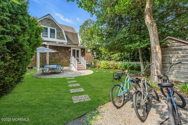 a house with garden in front of it