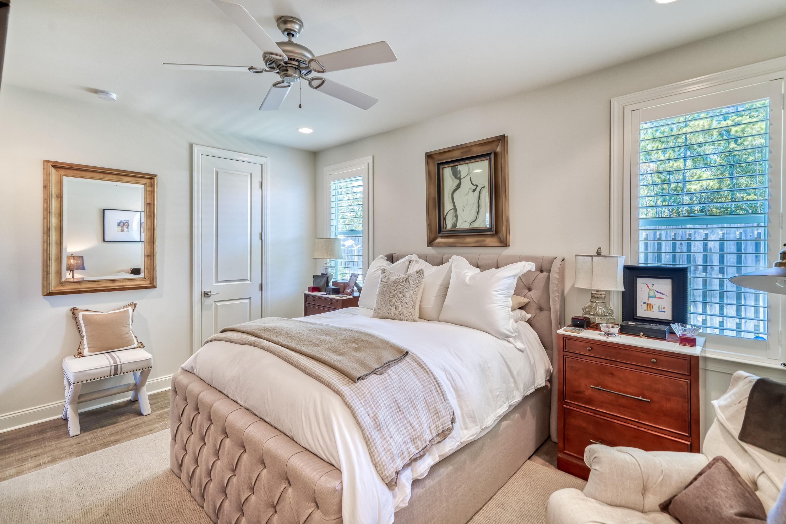 80 North Zander Way Santa Rosa Beach, FL 32459 - Photo 11 of 49 a bedroom with a bed couch and window