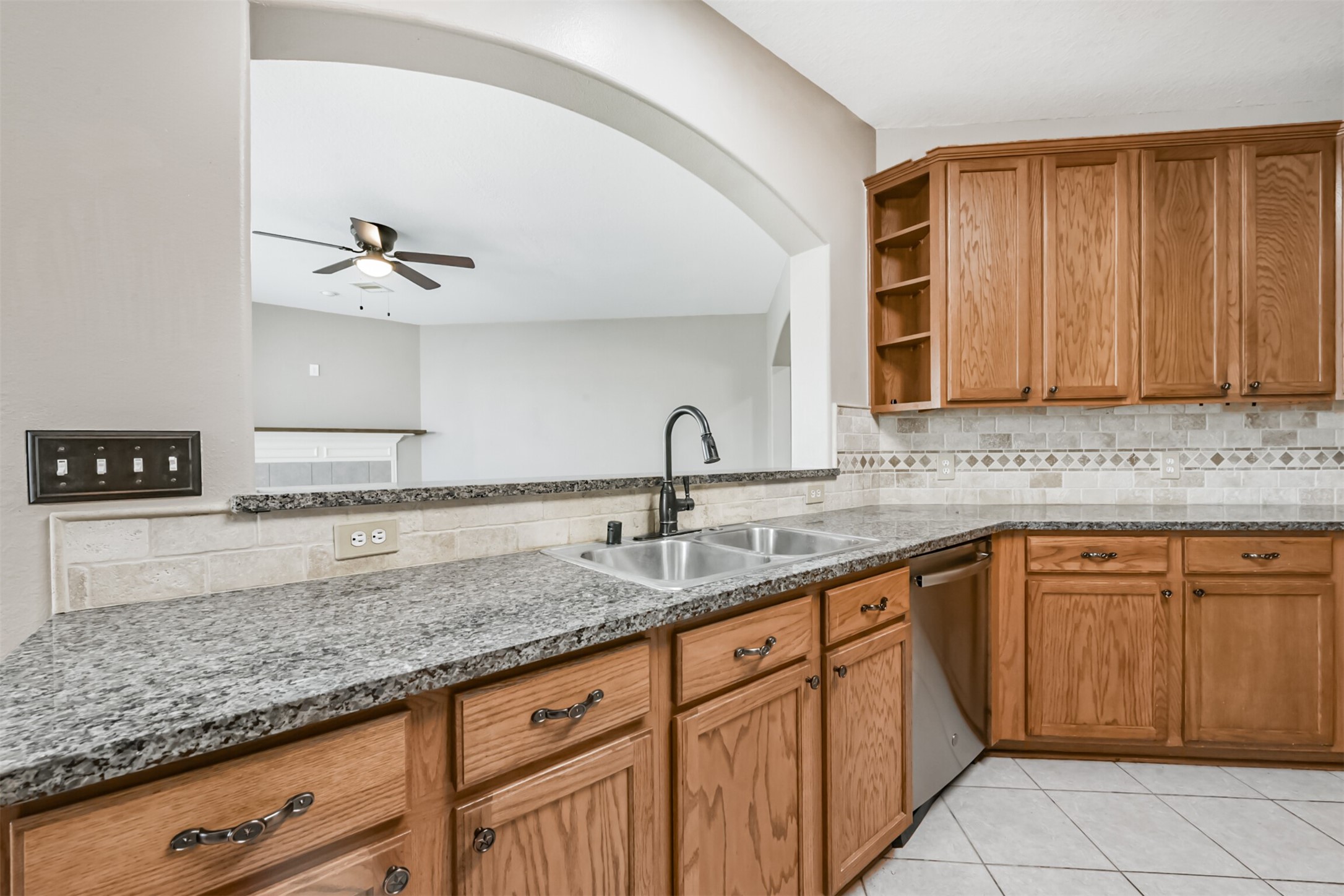 3919 Copper Creek Baytown, TX 77521 - Photo 12 of 50 a kitchen with sink and cabinets