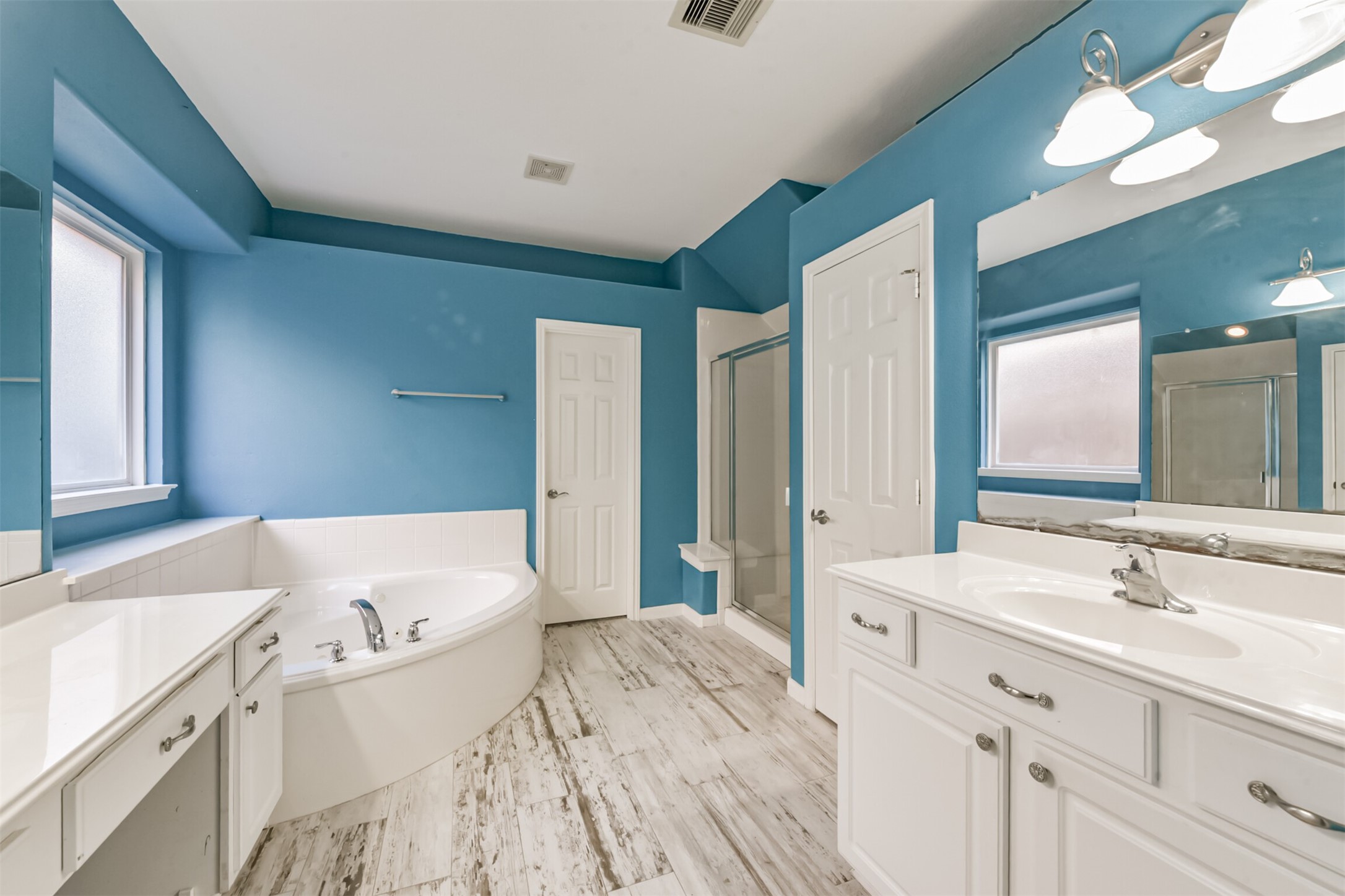 3919 Copper Creek Baytown, TX 77521 - Photo 27 of 50 a bathroom with a double vanity sink mirror and double