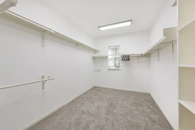 a view of a room with racks on the wall