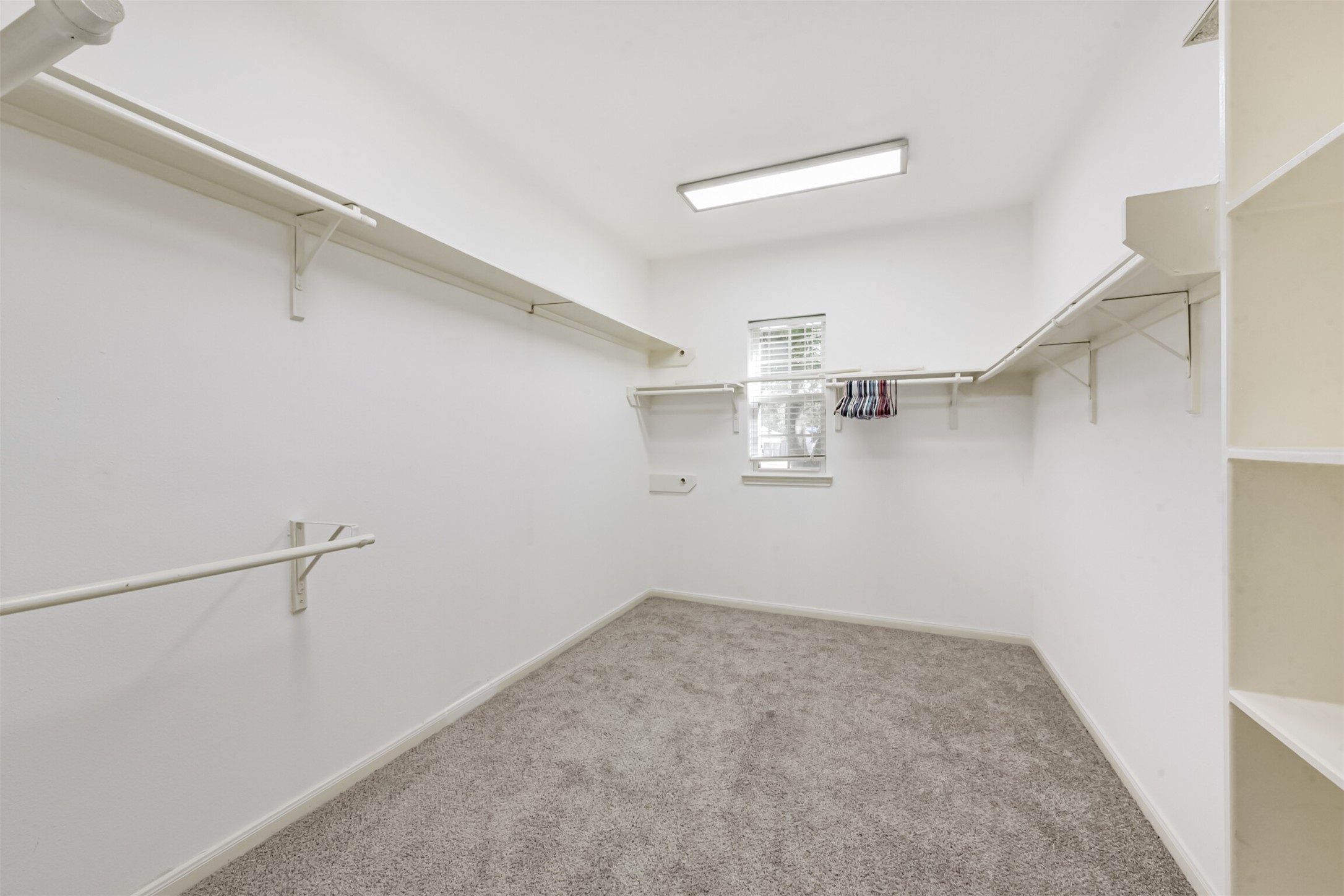 3919 Copper Creek Baytown, TX 77521 - Photo 30 of 50 a view of a room with racks on the wall