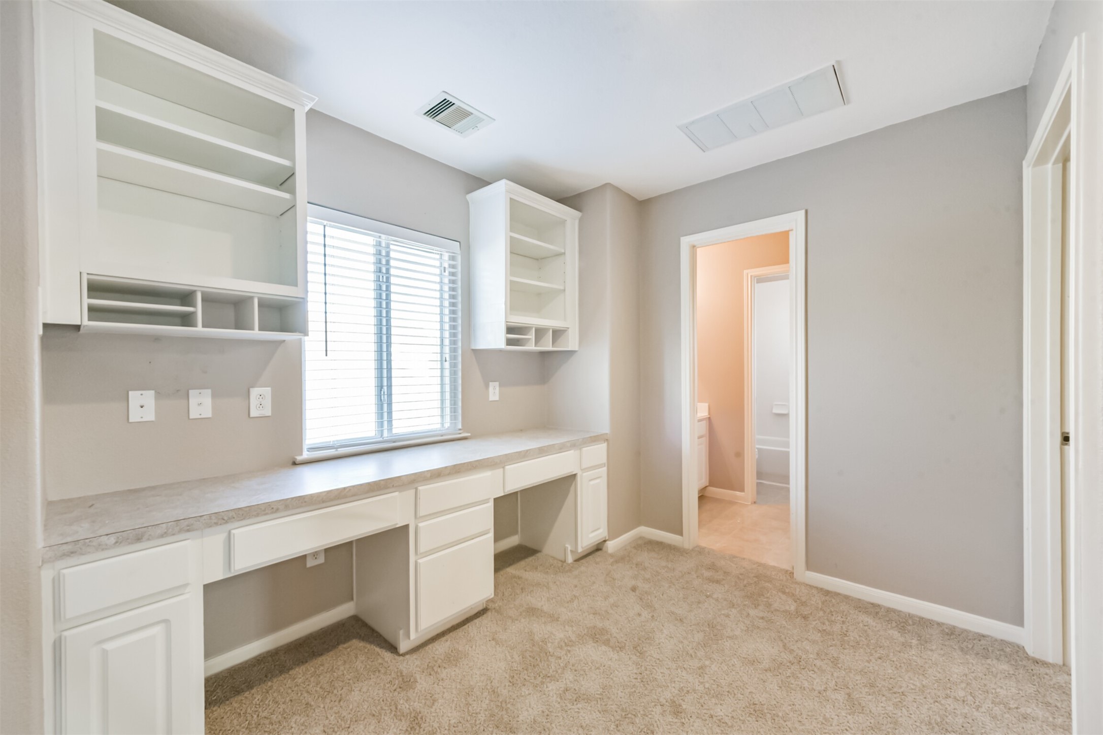 3919 Copper Creek Baytown, TX 77521 - Photo 31 of 50 a view of a kitchen cabinets a sink and a window