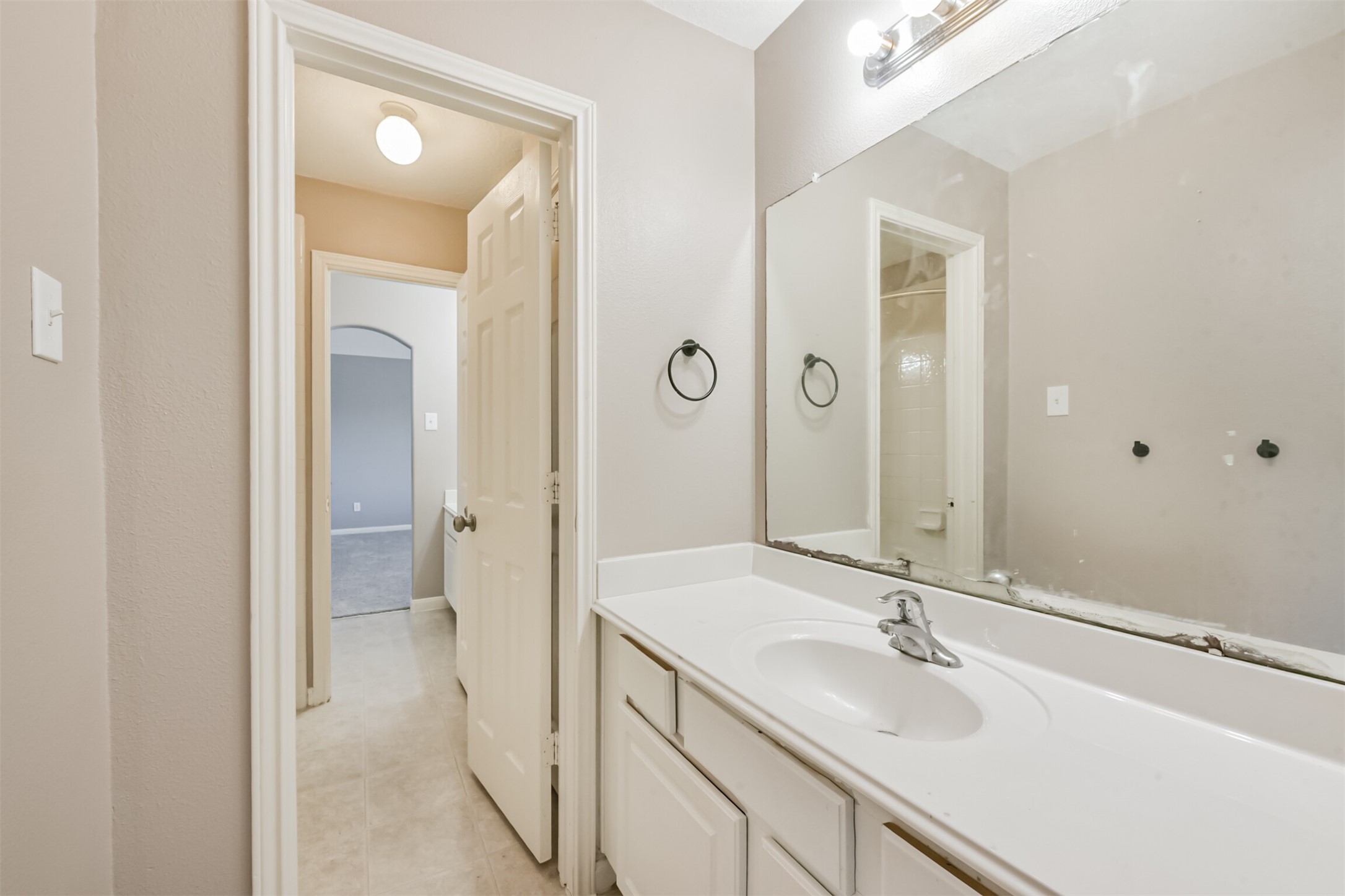 3919 Copper Creek Baytown, TX 77521 - Photo 41 of 50 a bathroom with a sink and a mirror