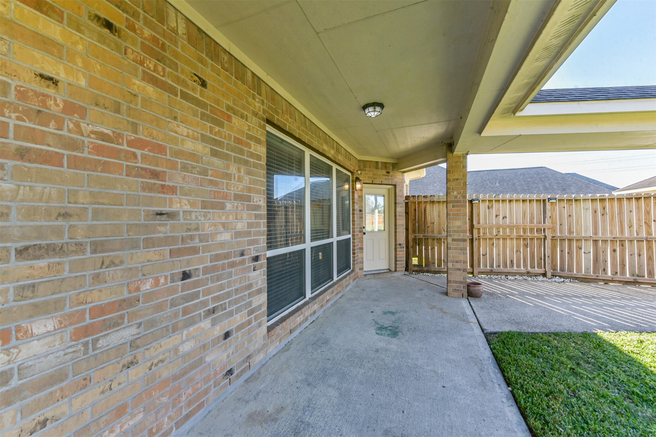3919 Copper Creek Baytown, TX 77521 - Photo 45 of 50 a view of an empty room with wooden floor and a window