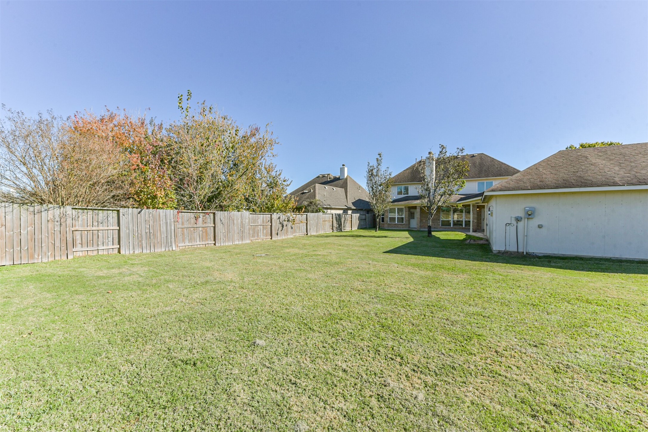 3919 Copper Creek Baytown, TX 77521 - Photo 48 of 50 a view of a house with a yard and a garage