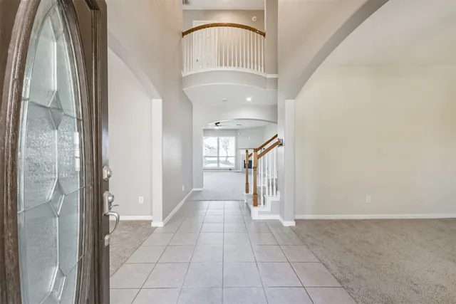 a view of a hallway with entryway