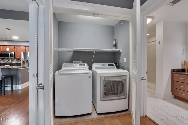 a utility room with dryer and washer