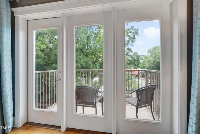 a view of a room that has a bed