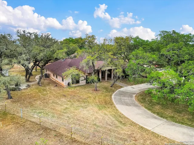a house with yard in front of it