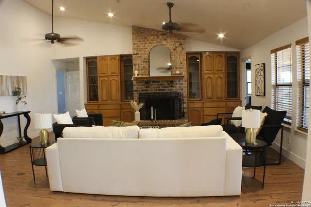 a bedroom with bed and a window