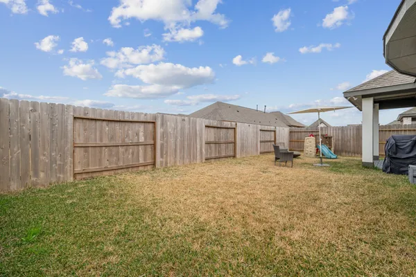 a house view with a garden space