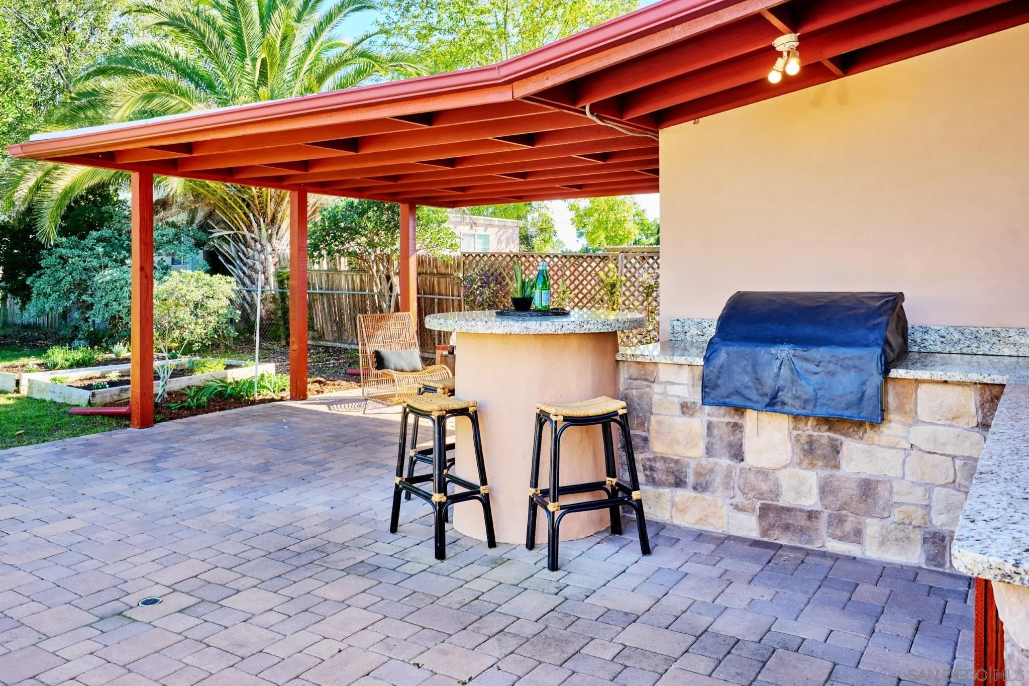 4591 68th Street La Mesa, CA 91942 - Photo 12 of 19 Granite counters, stainless steel grill, sink, storage, high top bistro table.