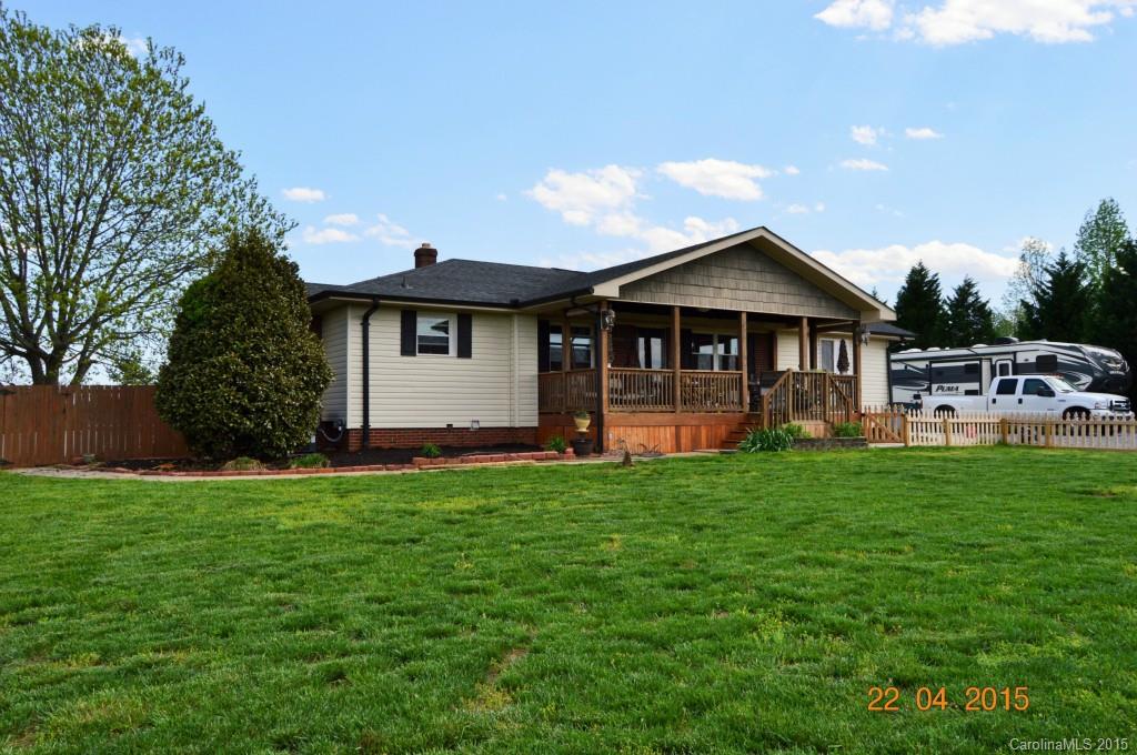 10060 Unity Church Road Mooresville, NC 28115 - Photo 1 of 22 a front view of a house with a yard