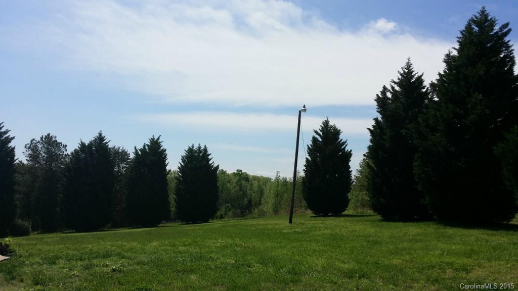 10060 Unity Church Road Mooresville, NC 28115 - Photo 11 of 22 a view of a grassy field